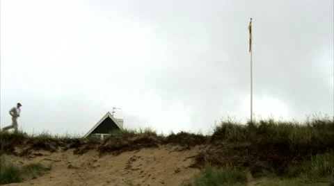 A man jogging by the sea Stock-Footage 11319995