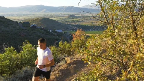 Man Jogs Past Camera In Slow Motion Stock Footage 78986664