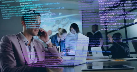Man joining smartphone call while typing code for code review as colleagues Stock-Footage 311155244