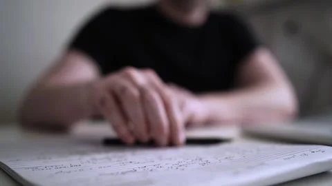 Man journaling thoughts into notebook 스톡 동영상 293050866