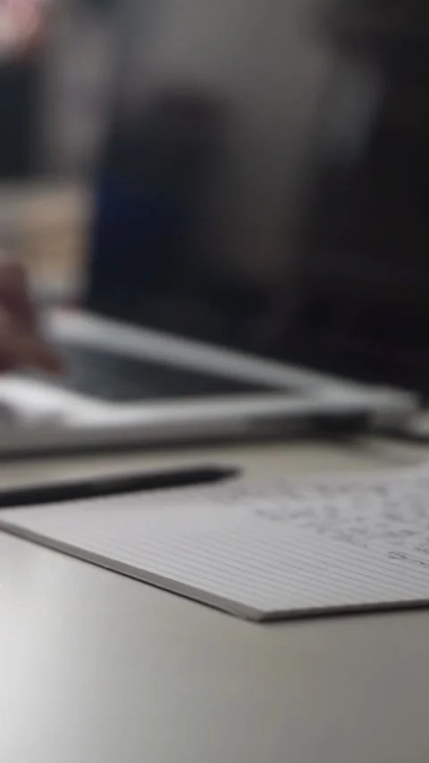 Man journaling thoughts into notebook Video stock 293073046