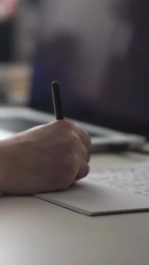 Man journaling thoughts into notebook 스톡 동영상 293073260