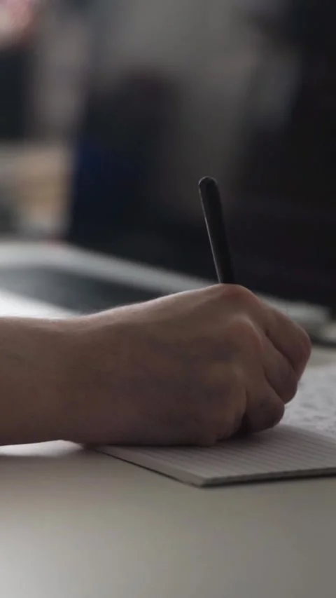 Man journaling thoughts into notebook 스톡 동영상 293073361