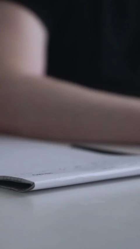 Man journaling thoughts into notebook Stock Footage 304083402