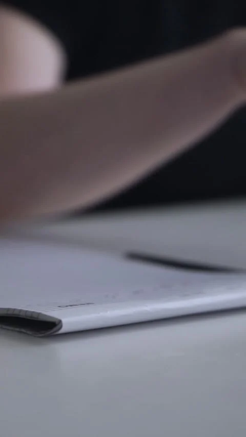 Man journaling thoughts into notebook Stock Footage 304083408