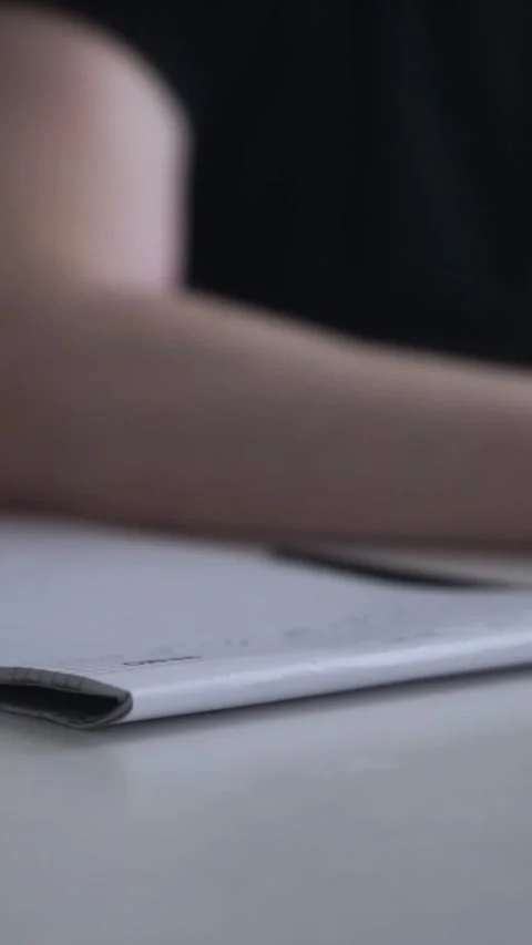 Man journaling thoughts into notebook Video stock 304083487