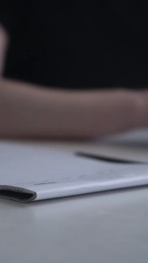 Man journaling thoughts into notebook Stock-Footage 304083500