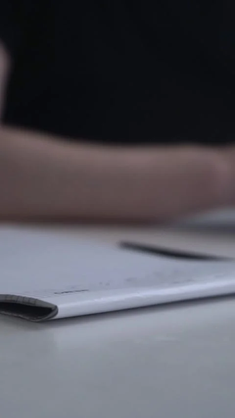 Man journaling thoughts into notebook Stock-Footage 304083504