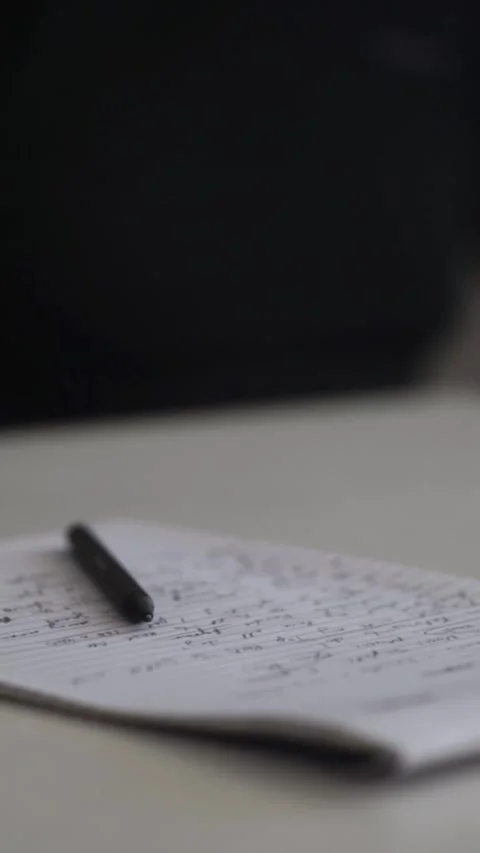 Man journaling thoughts into notebook Stock Footage 304083656