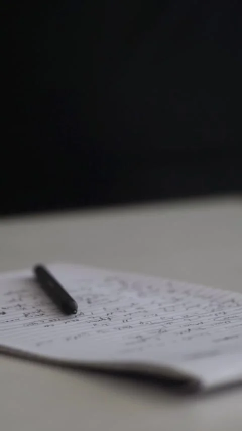 Man journaling thoughts into notebook 스톡 동영상 304084091