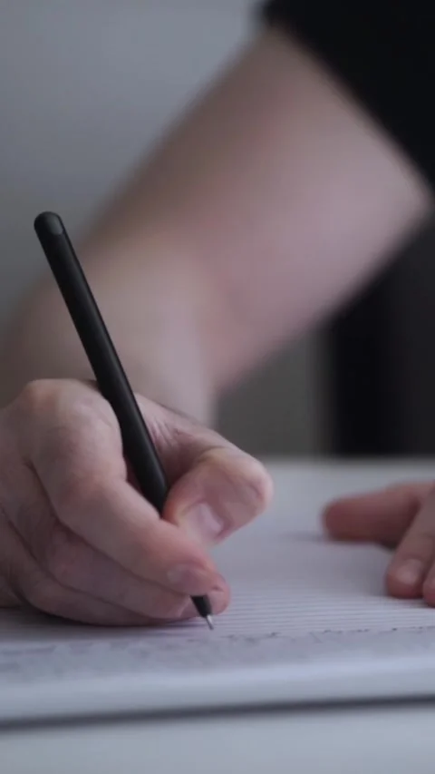 Man journaling thoughts into notebook Stock-Footage 304091117