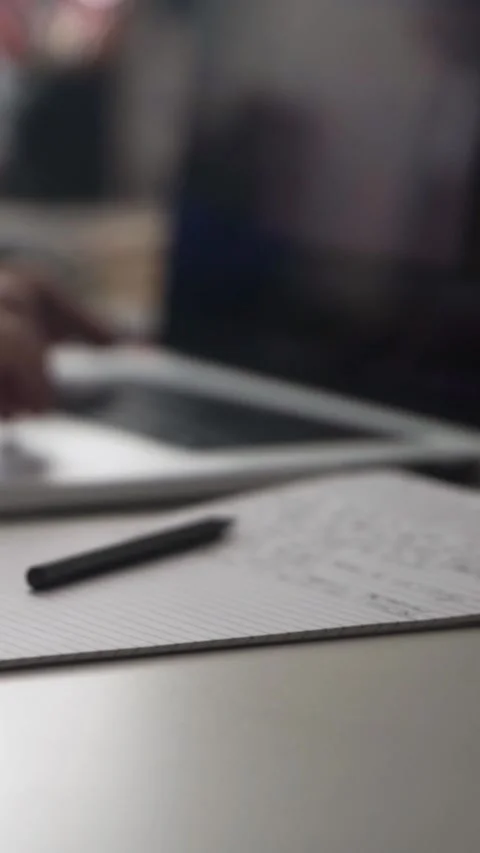 Man journaling thoughts into notebook Stock Footage 304091370