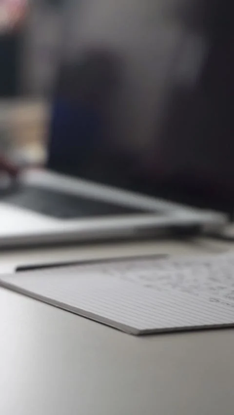 Man journaling thoughts into notebook Stock Footage 304091570