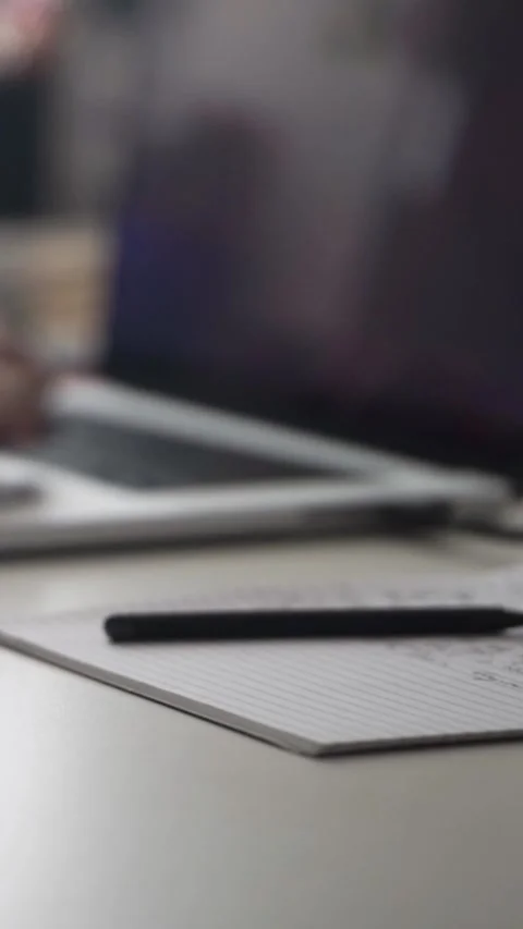 Man journaling thoughts into notebook Видео 304091580