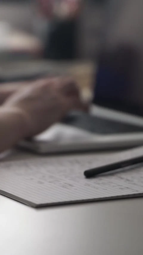 Man journaling thoughts into notebook Stock Footage 304091794