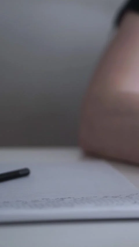 Man journaling thoughts into notebook Видео 304091813