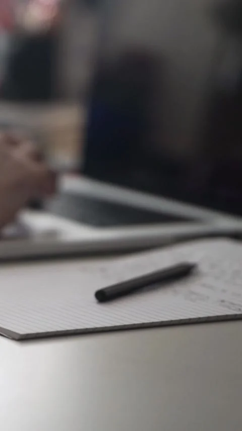 Man journaling thoughts into notebook Stock Footage 304091834