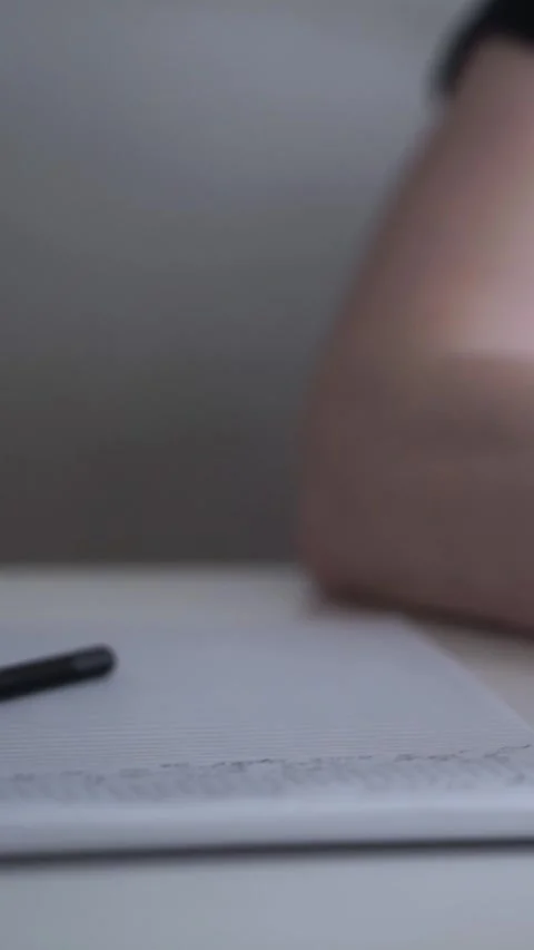 Man journaling thoughts into notebook Stock Footage 304091843