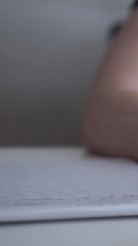 Man journaling thoughts into notebook Stock Footage 304091867