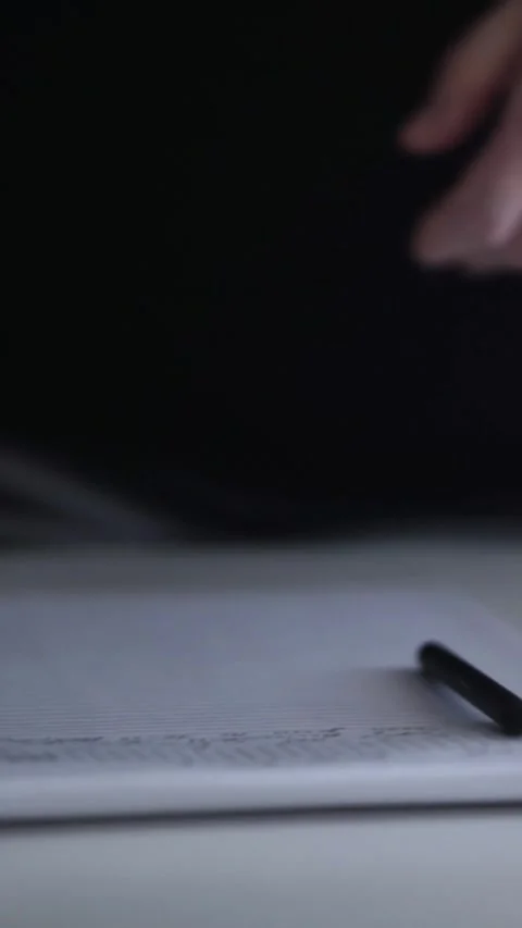 Man journaling thoughts into notebook Video stock 304091951