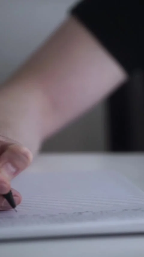 Man journaling thoughts into notebook Video stock 304092276