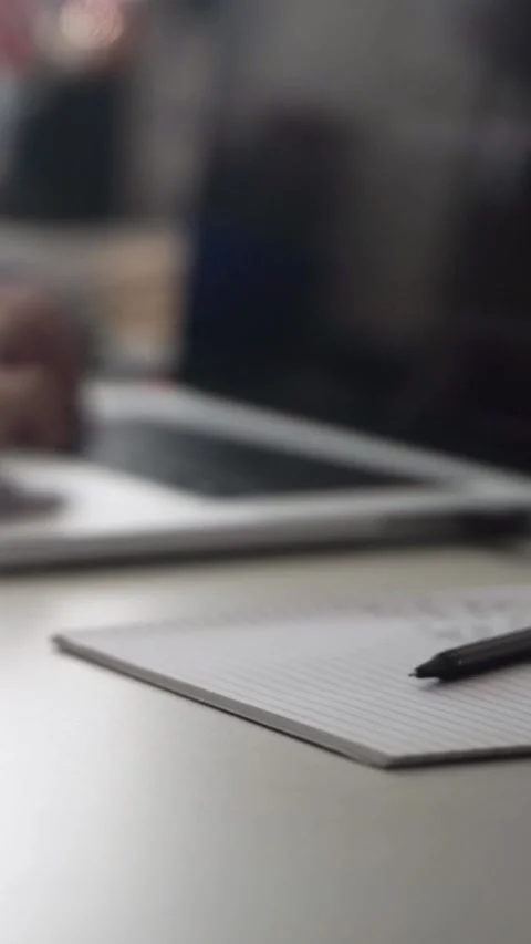 Man journaling thoughts into notebook Stock Footage 304093630