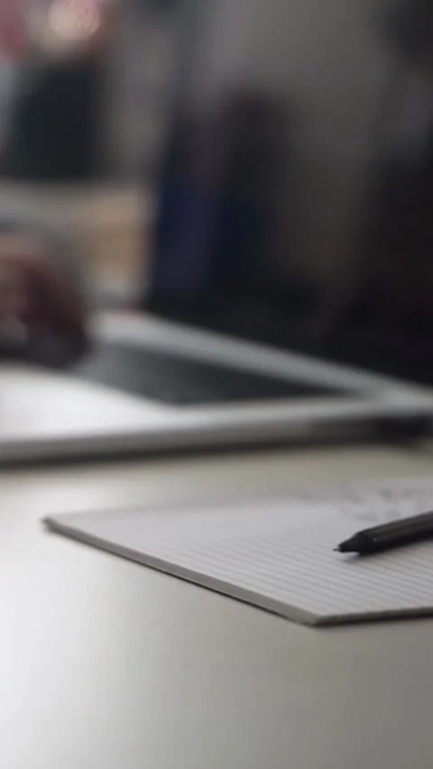 Man journaling thoughts into notebook Видео 304093637