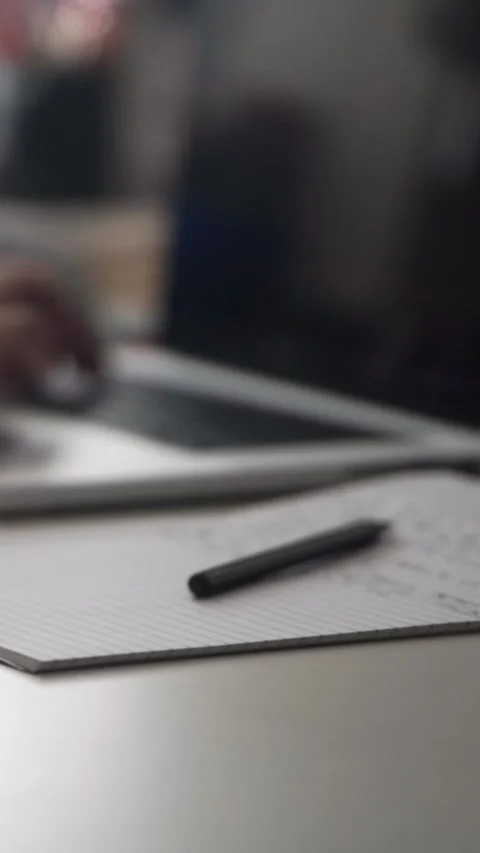 Man journaling thoughts into notebook Video stock 304094248