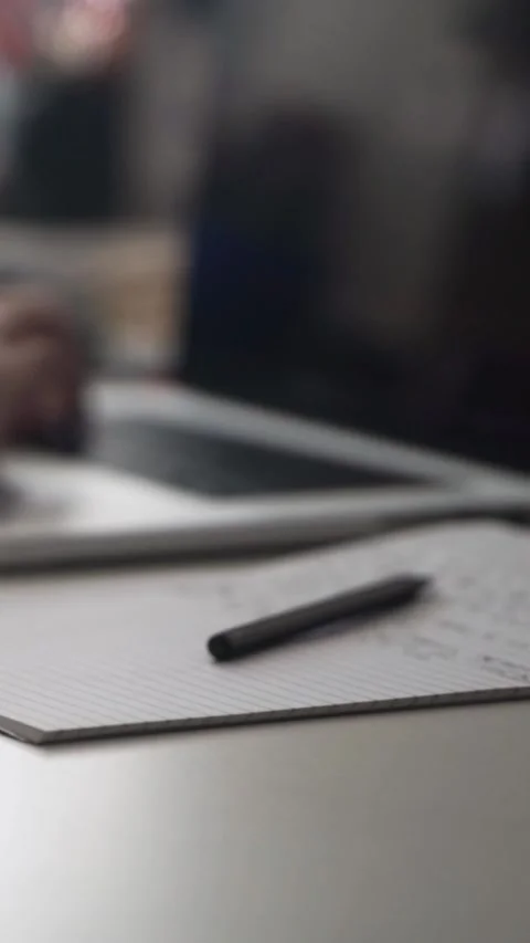 Man journaling thoughts into notebook 스톡 동영상 304094252