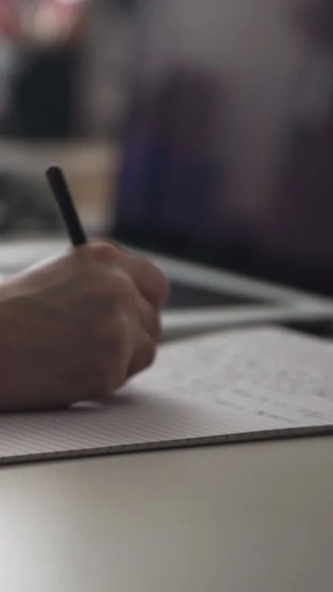 Man journaling thoughts into notebook Stock-Footage 304095951