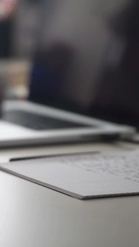 Man journaling thoughts into notebook Stock Footage 304096433