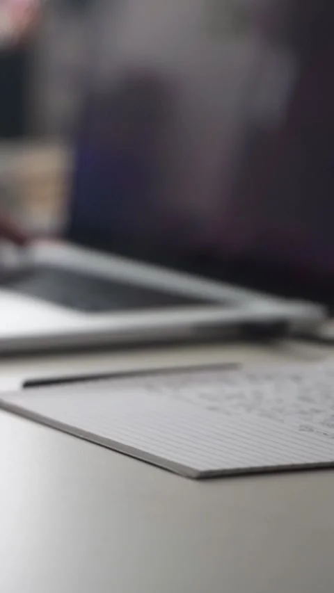 Man journaling thoughts into notebook Stock Footage 304096447