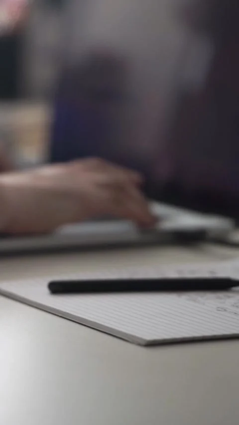 Man journaling thoughts into notebook Видео 304096451