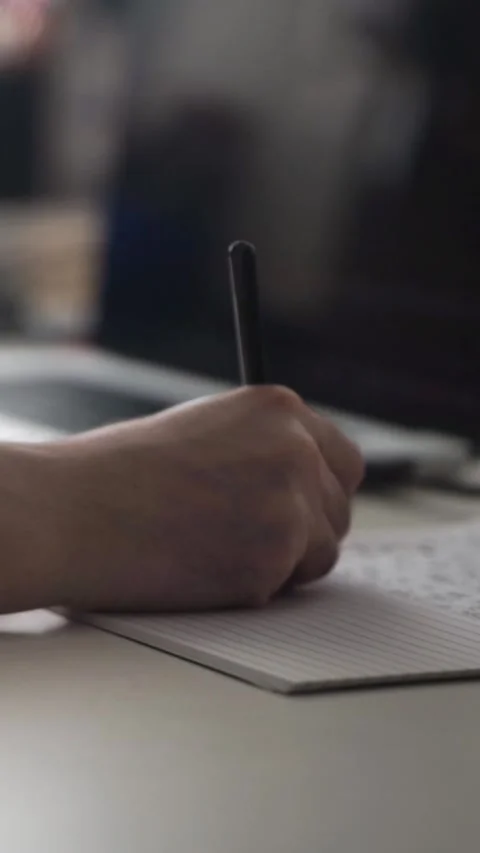 Man journaling thoughts into notebook 스톡 동영상 304113160