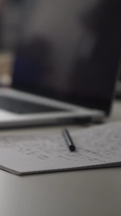 Man journaling thoughts into notebook Stock Footage 304113176