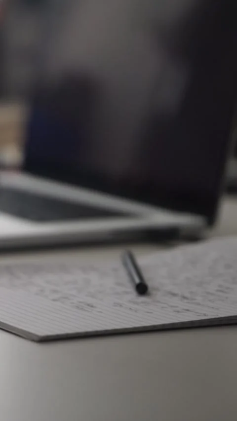 Man journaling thoughts into notebook Video stock 304113209