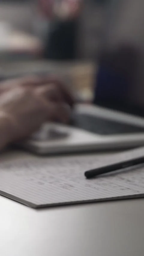 Man journaling thoughts into notebook Video stock 304114409