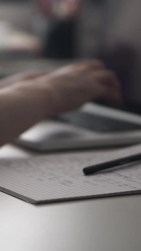 Man journaling thoughts into notebook Stock Footage 304114449