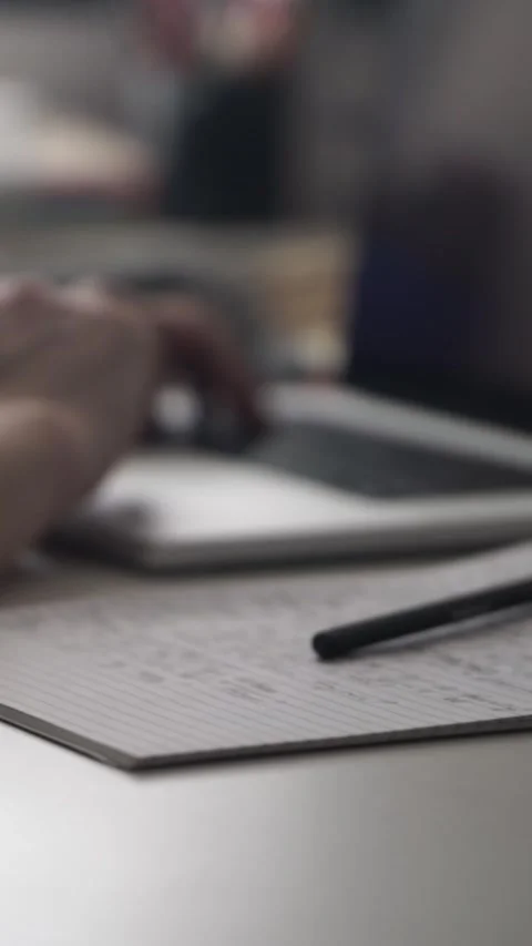 Man journaling thoughts into notebook Stock Footage 304114460