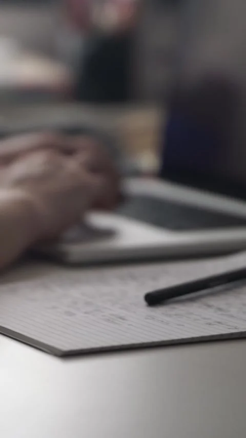 Man journaling thoughts into notebook Video stock 304114474