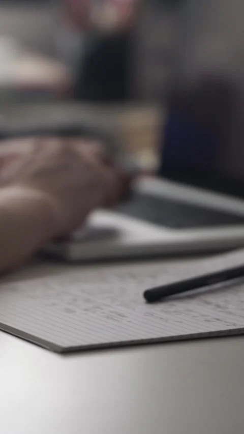 Man journaling thoughts into notebook Stock Footage 304114486