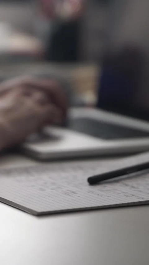 Man journaling thoughts into notebook Stock Footage 304114590