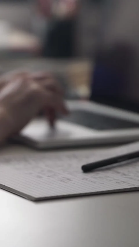 Man journaling thoughts into notebook Видео 304114596