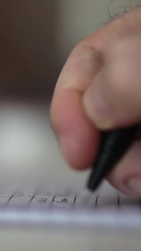 Man journaling thoughts into notebook Stock-Footage 304116101