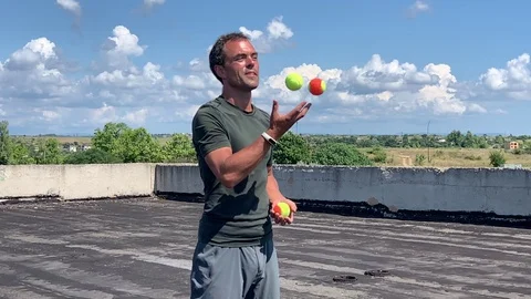 Man juggles Stock Footage 113016552