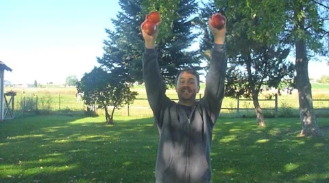 Man Juggling Apples Outdoors Stock Footage 8437997