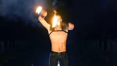 Man juggling fireballs Stock Footage 71528946