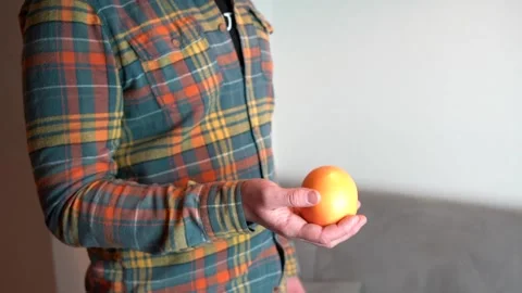 Man juggling with grape fruit Stock Footage 160814447
