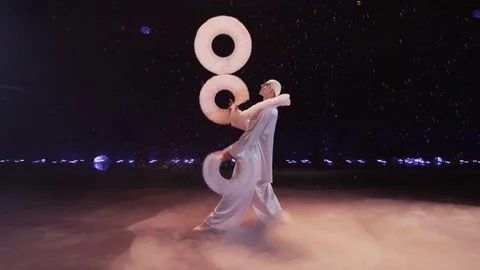 Man juggling soft rings in the circus Stock Footage 72607701