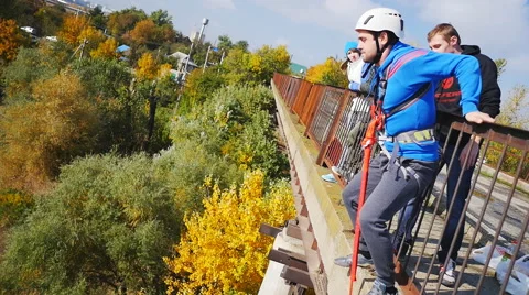 Man jump bridge front face Stock Footage 56428950